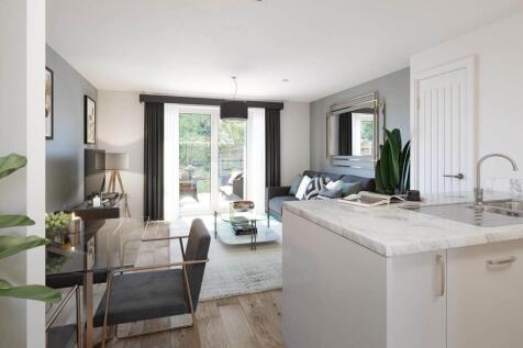 Double doors lead to the garden, making alfresco dining easy