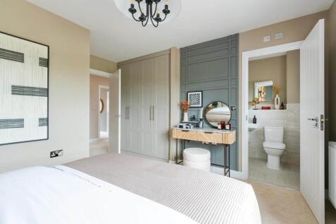 Bedroom 1 also hosts a private en suite shower room