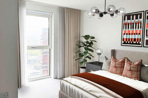 Bedroom with full height windows