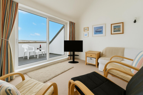 Coastal Living Room with Scenic View.png