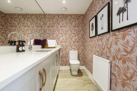 Handy cloakroom and utility room with laundry space
