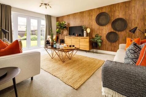 Spacious living room which also features French doors to the rear garden