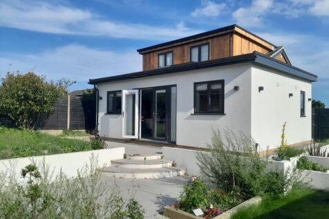 A 4 bedroom semi-detached chalet-style bungalow