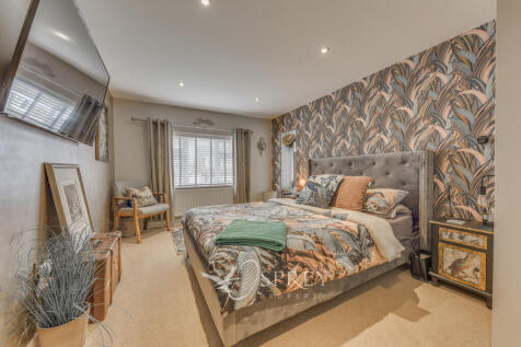 Principle Bedroom...
