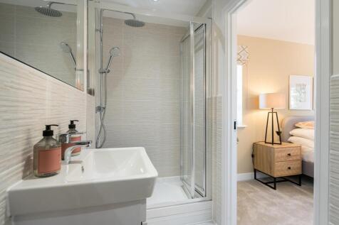 The en-suite benefits from a double shower