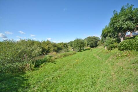 PHOTOS SHOW GENERAL VIEW OF DEVELOPMENT