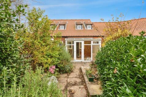 PROPERTY SHOWS VIEW FROM REAR