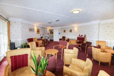 PHOTOS SHOW GENERAL VIEW OF RETIREMEN...