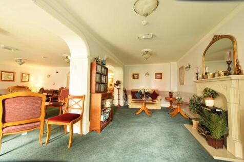 PHOTOS SHOW GENERAL VIEW OF RETIREMEN...