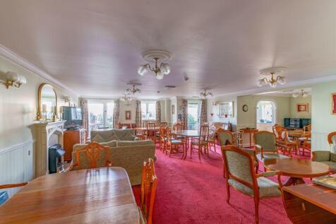 PHOTOS SHOW GENERAL VIEW OF RETIREMEN...
