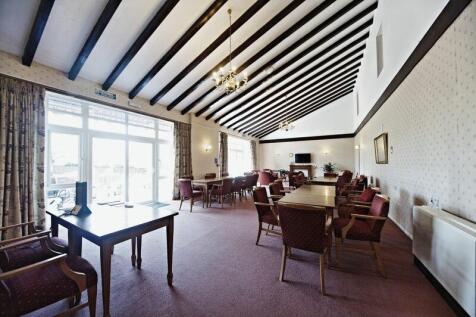 PHOTOS SHOW GENERAL VIEW OF RETIREMEN...