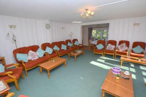 PHOTOS SHOW GENERAL VIEW OF RETIREMEN...
