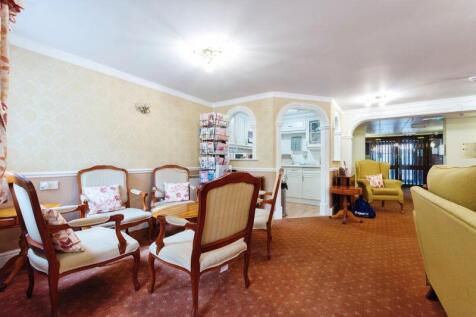 PHOTOS SHOW GENERAL VIEW OF RETIREMEN...