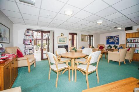PHOTOS SHOW GENERAL VIEW OF RETIREMEN...