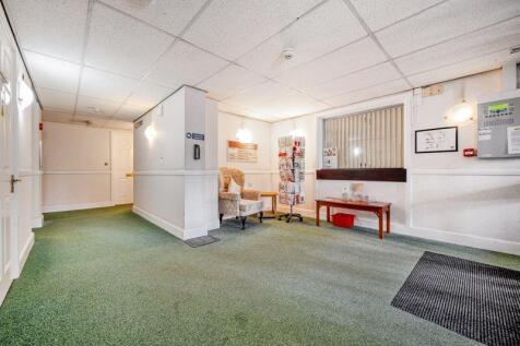 PHOTOS SHOW GENERAL VIEW OF A RETIREM...