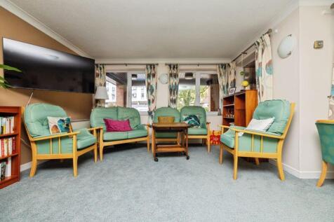 PHOTOS SHOW GENERAL VIEW OF RETIREMEN...
