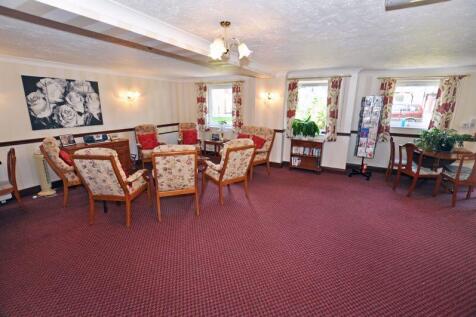 PHOTOS SHOW GENERAL VIEW OF RETIREMEN...