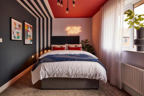 The large bedroom on the first floor has ample storage space