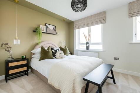 Bedroom 2 is spacious and bright