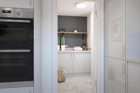 A utility room allows for separate area to do the laundry