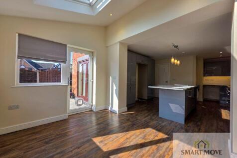 Breakfast Room into Kitchen