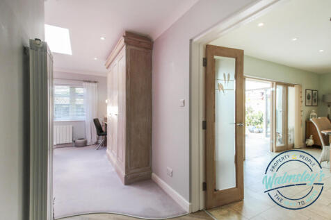 Main bedroom with French doors to dining room