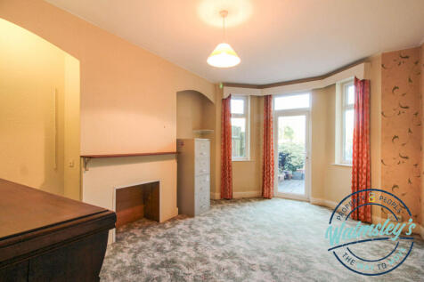 Rear sitting room with patio door