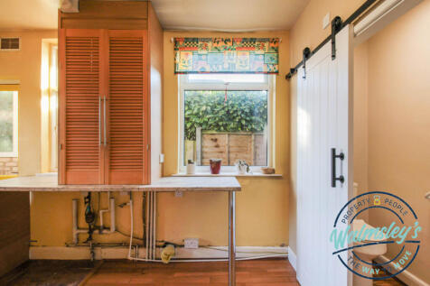 Breakfast end of kitchen &amp; cloakroom