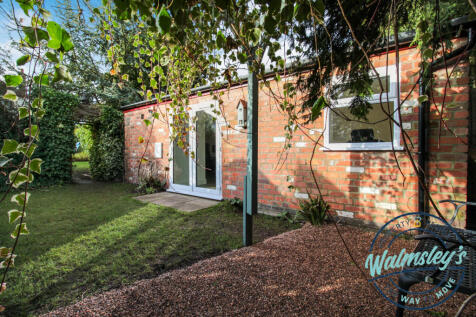 Detached gym/office/therapy room conversion