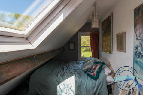 One of the four loft bedrooms