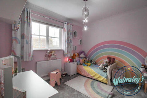 Bedroom three with garden views