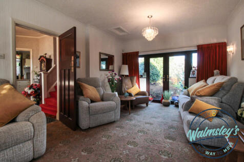Sitting room with French doors to gardens