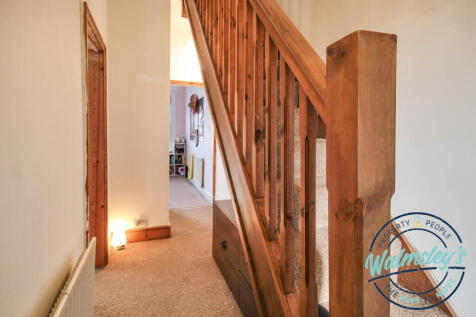 1st floor landing with stairs to 2nd floor