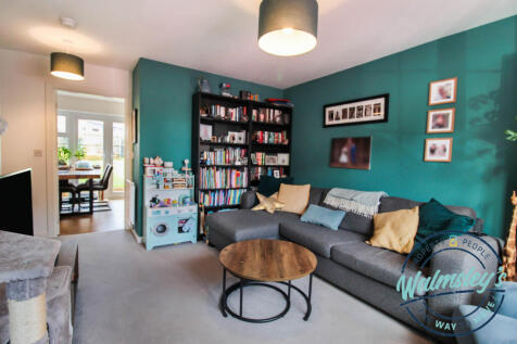 Sitting room through to kitchen