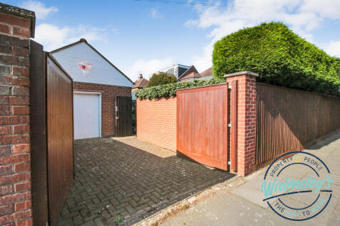 Gated driveway and garage