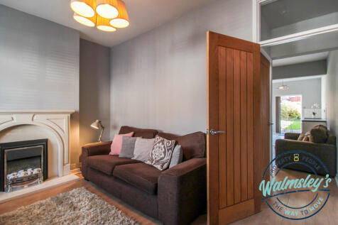 Sitting room through to rear