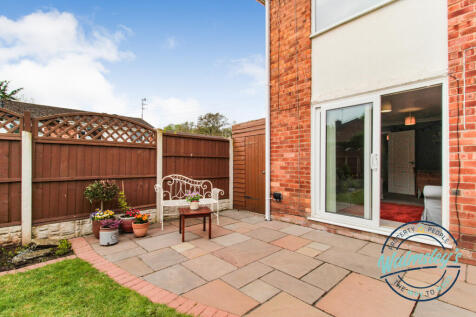 Rear gardens and patio doors to sitting room