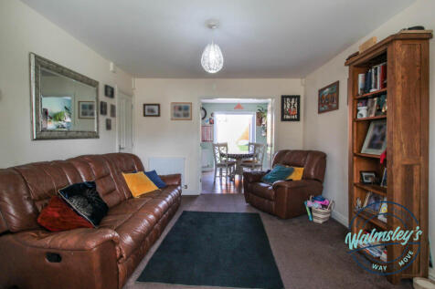 Sitting room with French doors to dining room