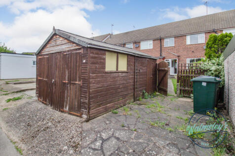 Driveway &amp; garage area to rear