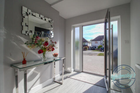 Hallway with front door opened