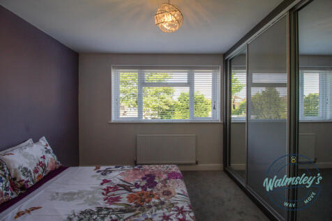 Bedroom three with fitted wardrobes