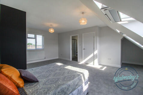 Main bedroom with door to ensuite &amp; top floor land