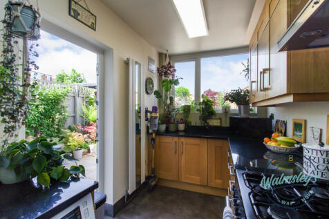 Rear of kitchen with patio door_1