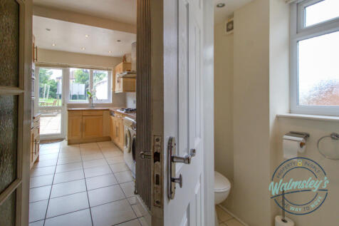 Ground floor cloakroom &amp; kitchen beyond