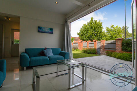 Bi-folding doors off family room