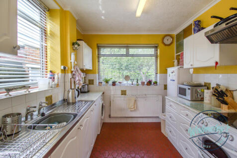 Kitchen with patio door to side driveway