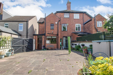 Rear elevation and doors to kitchen &amp; rear sitting
