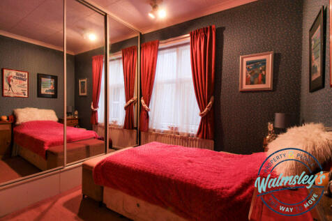 Bedroom three with fitted wardrobes