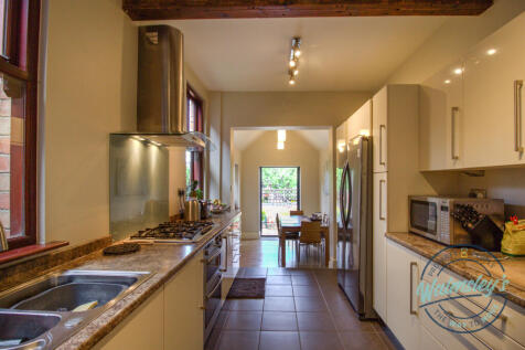 Kitchen with extension beyond