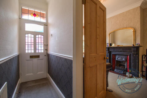 Entrance &amp; front sitting room